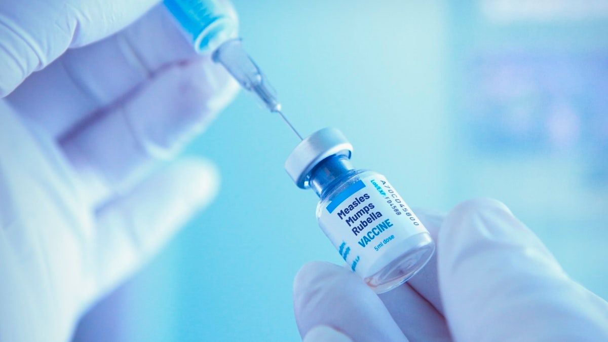 MMR vaccine vials and syringe