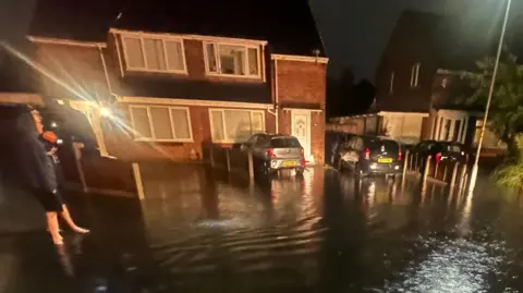 North West England Flood Warnings Persist as Heavy Rain Lashes Region