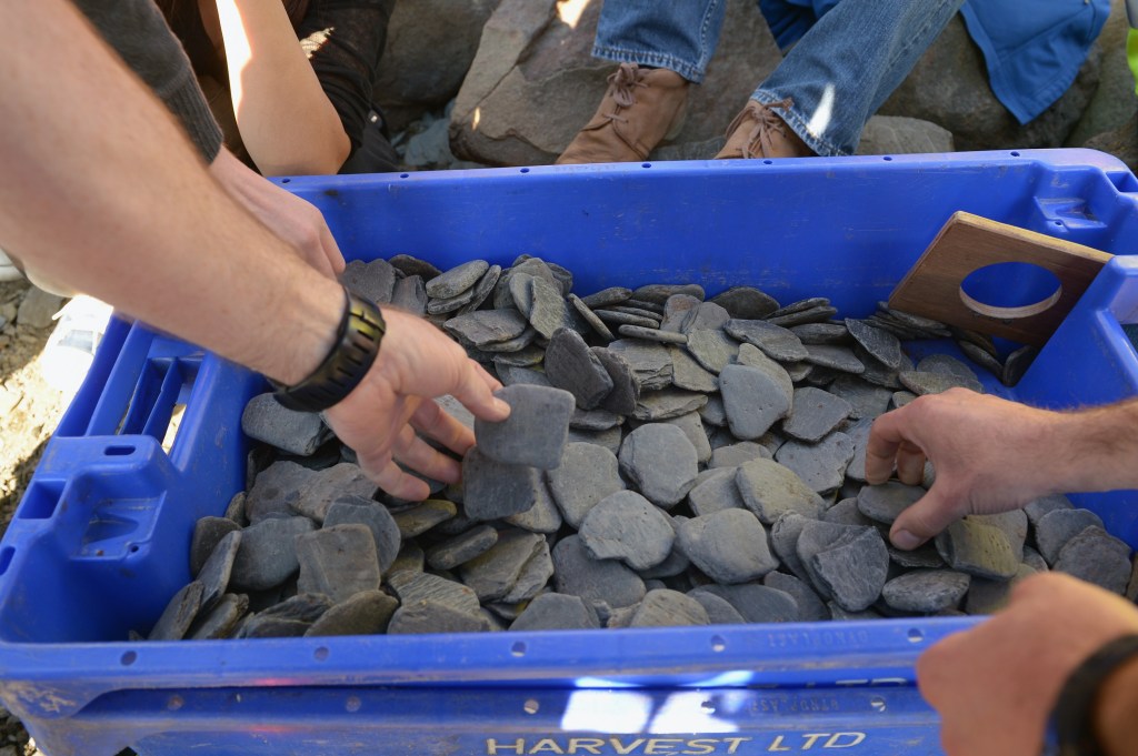 Spectators watch the skimming competition