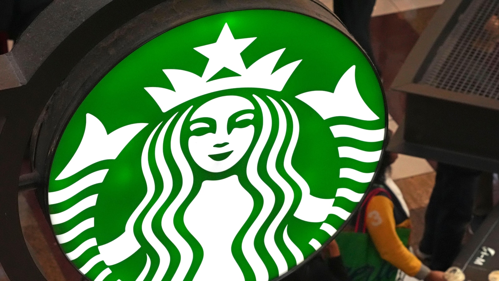 Starbucks workers sue over dress code, alleging unreimbursed costs as union drive intensifies
