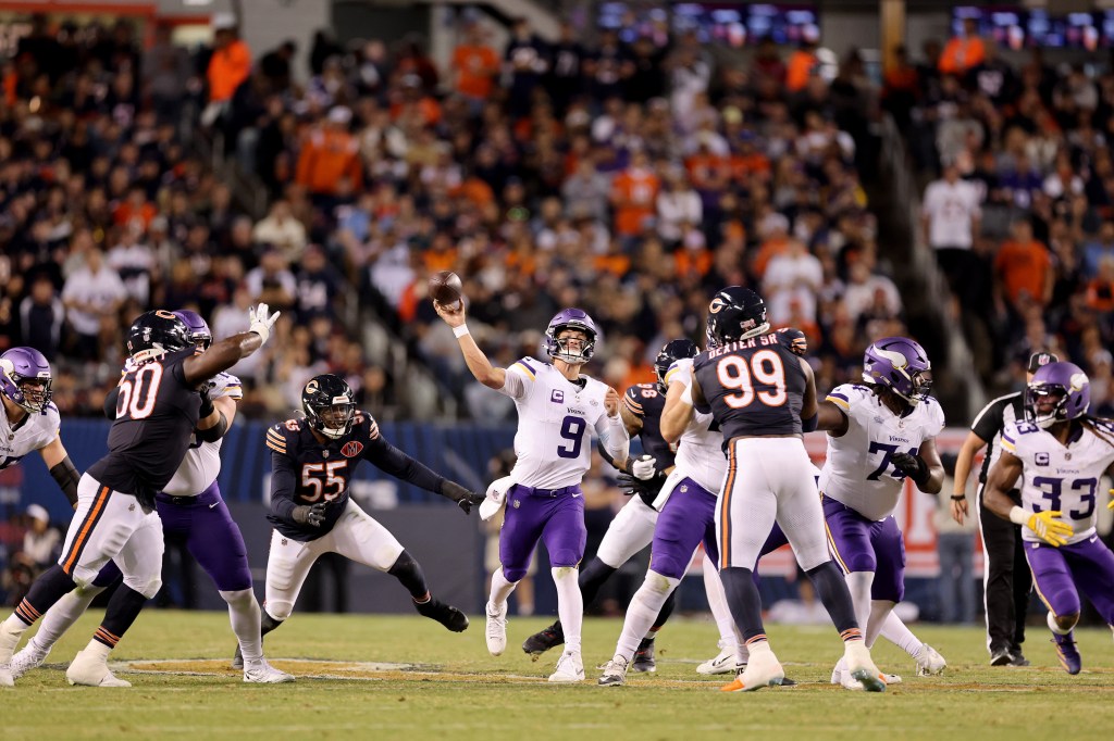 J.J. McCarthy attempts a throw during the Vikings’ Sept. 8 win against the Bears