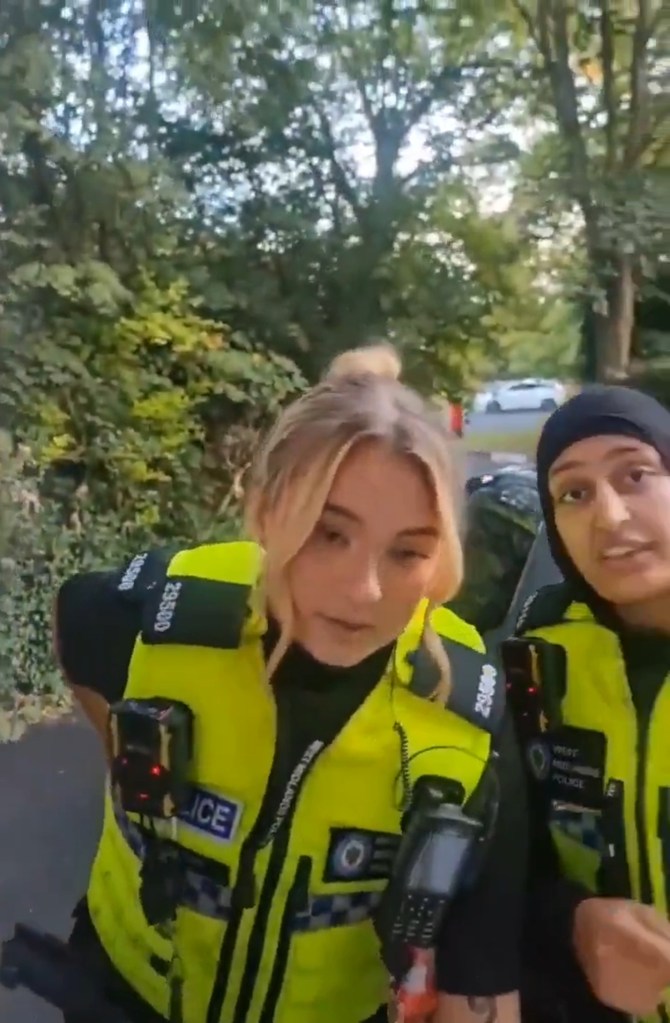 Two officers at the family address during the visit