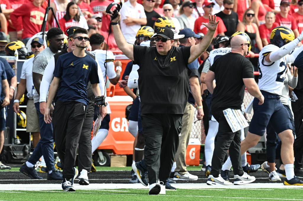 Poggi guides Michigan to 30-27 win at Nebraska as Moore returns for Big Ten opener