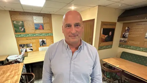 Algal scum and discoloured water on Lough Neagh