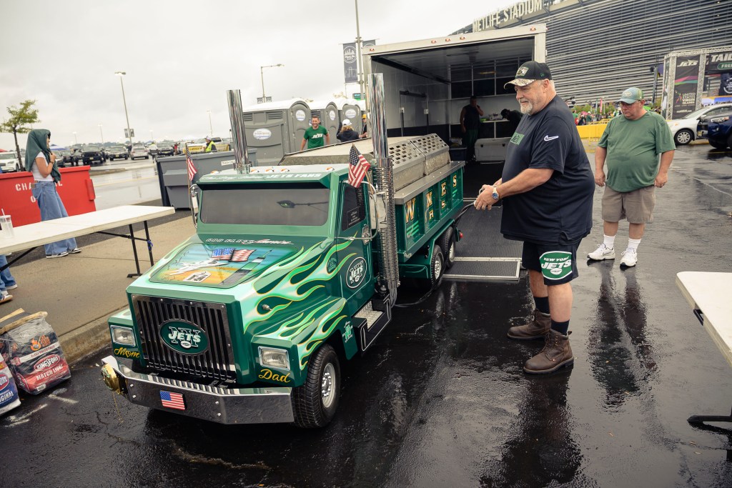 Wheels of the mobile grill being unloaded at MetLife Stadium