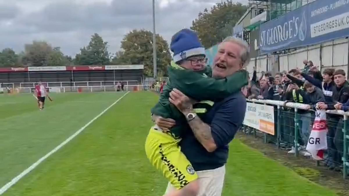 Savage lifts young fan onto pitch after Forest Green Rovers' 2-0 win at Woking