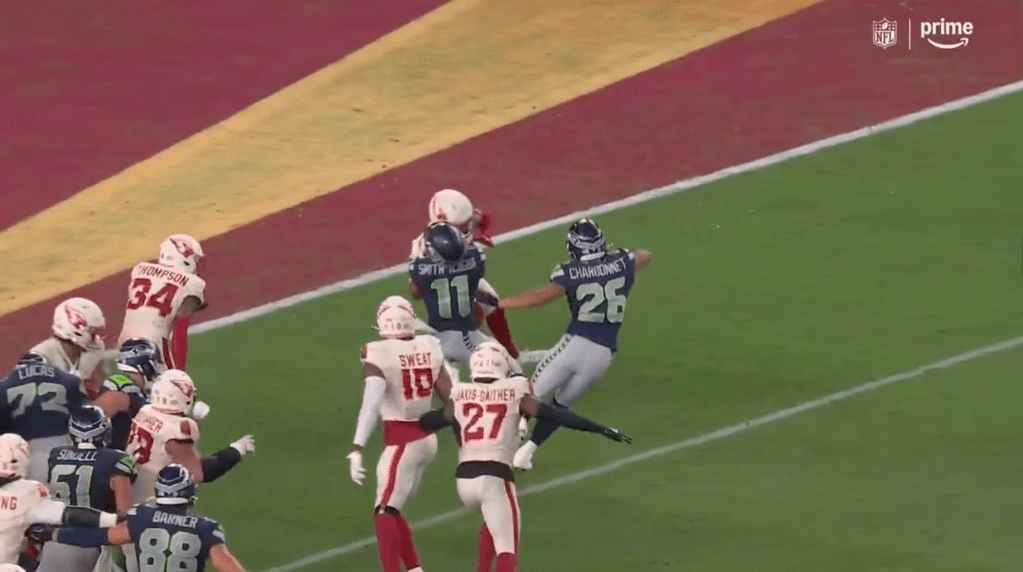 Jaxon Smith-Njigba holding