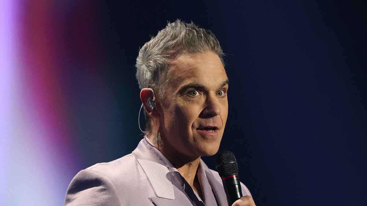 Robbie Williams says gallows humor helps talk to kids about addiction while celebrating decades of sobriety