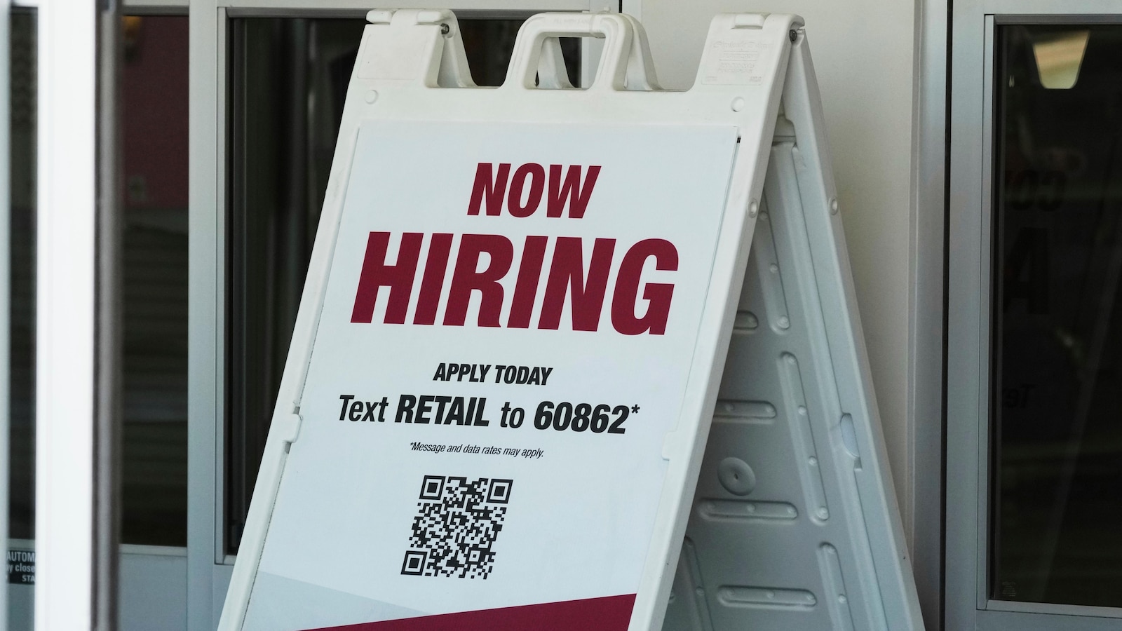 Fewer Americans file for jobless benefits as labor market signals cool