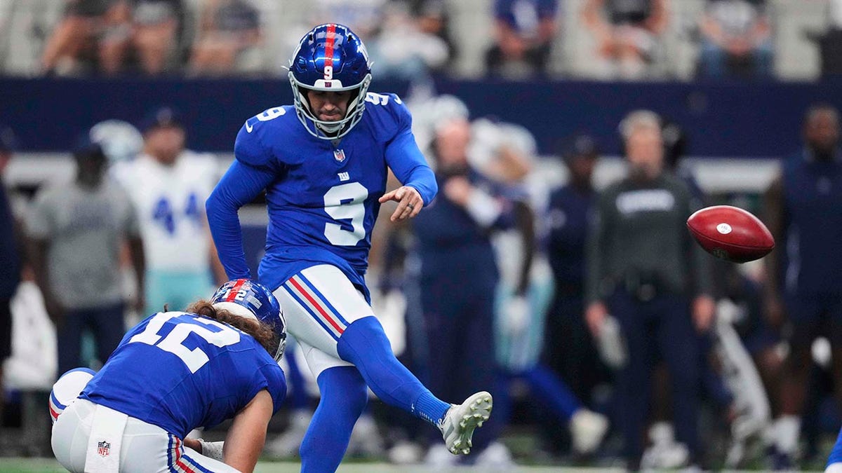 Graham Gano kicks a field goal