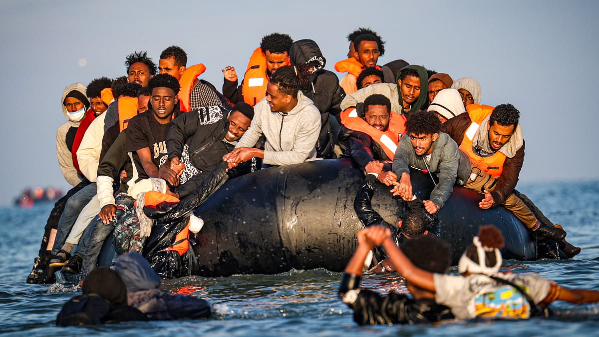 Two Somali women die as overloaded Channel dinghy carrying about 100 migrants sinks off northern France