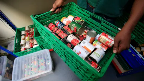 UK food banks reach crisis point as demand spikes and donations fall