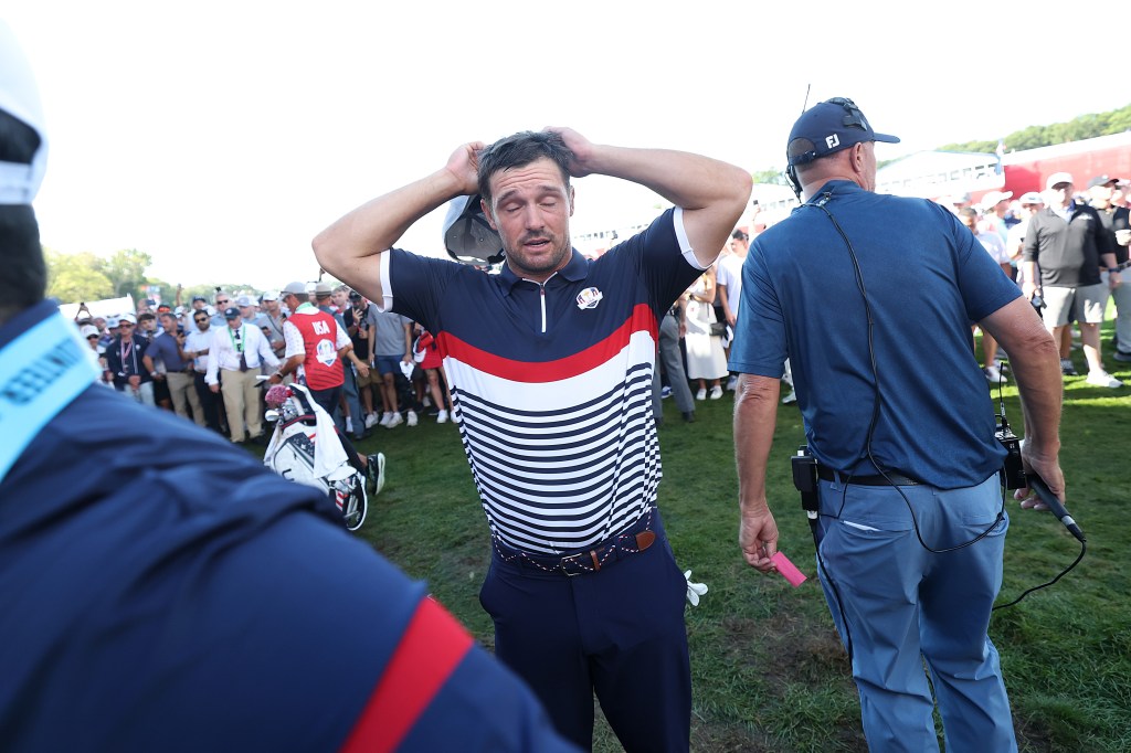 Bryson DeChambeau reacts on the 15th green