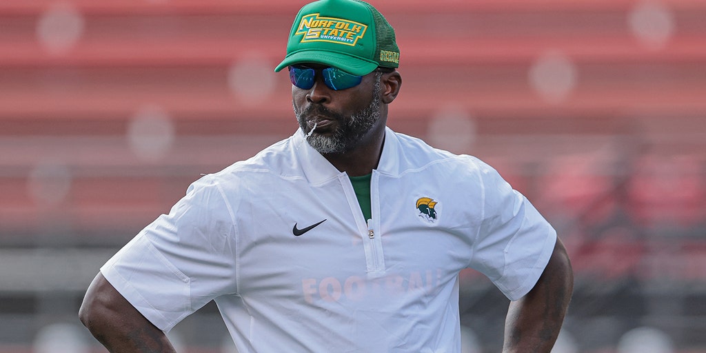 Vick coaching on the sideline