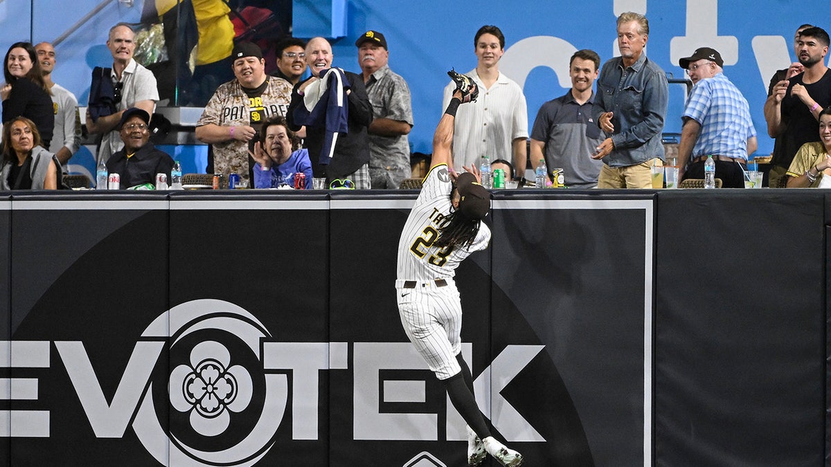 Tatis watches the play unfold in right field