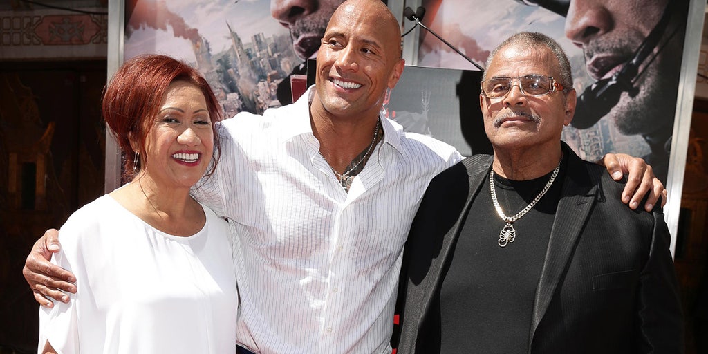 Dwayne Johnson with his parents