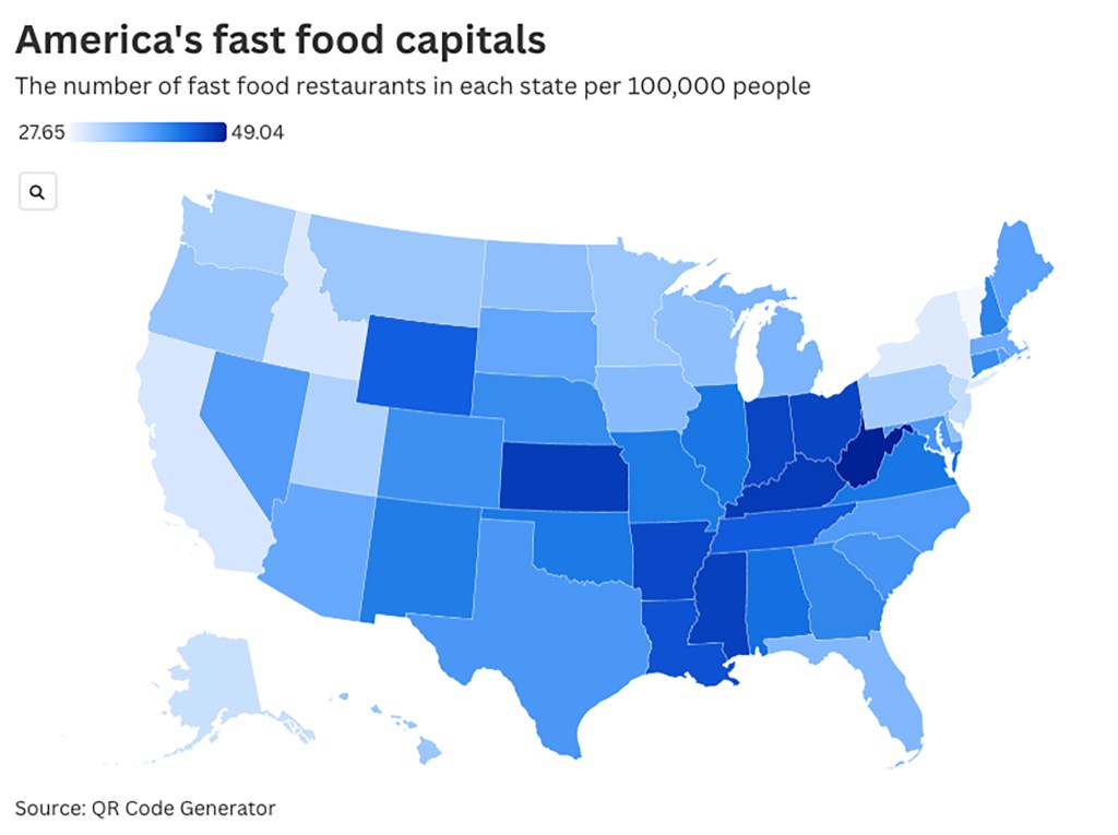 People walking past a Subway restaurant exterior