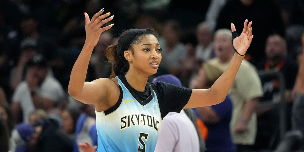 Angel Reese brings the ball up court