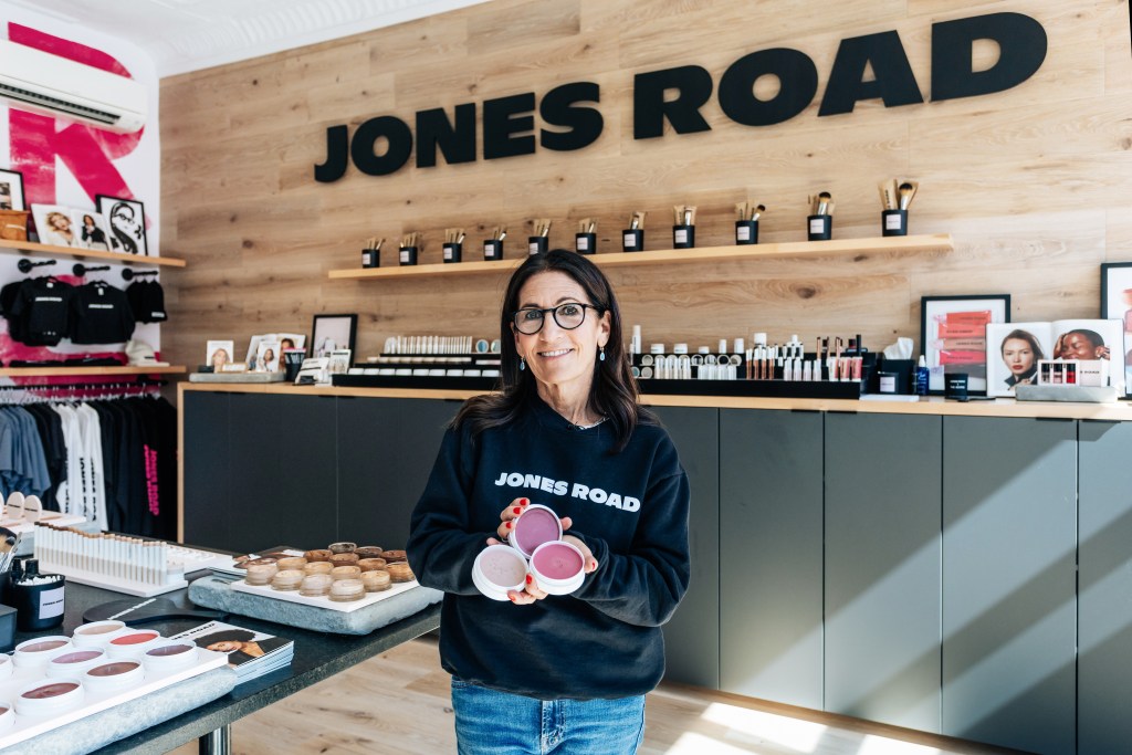 Bobbi Brown holding Miracle Balm