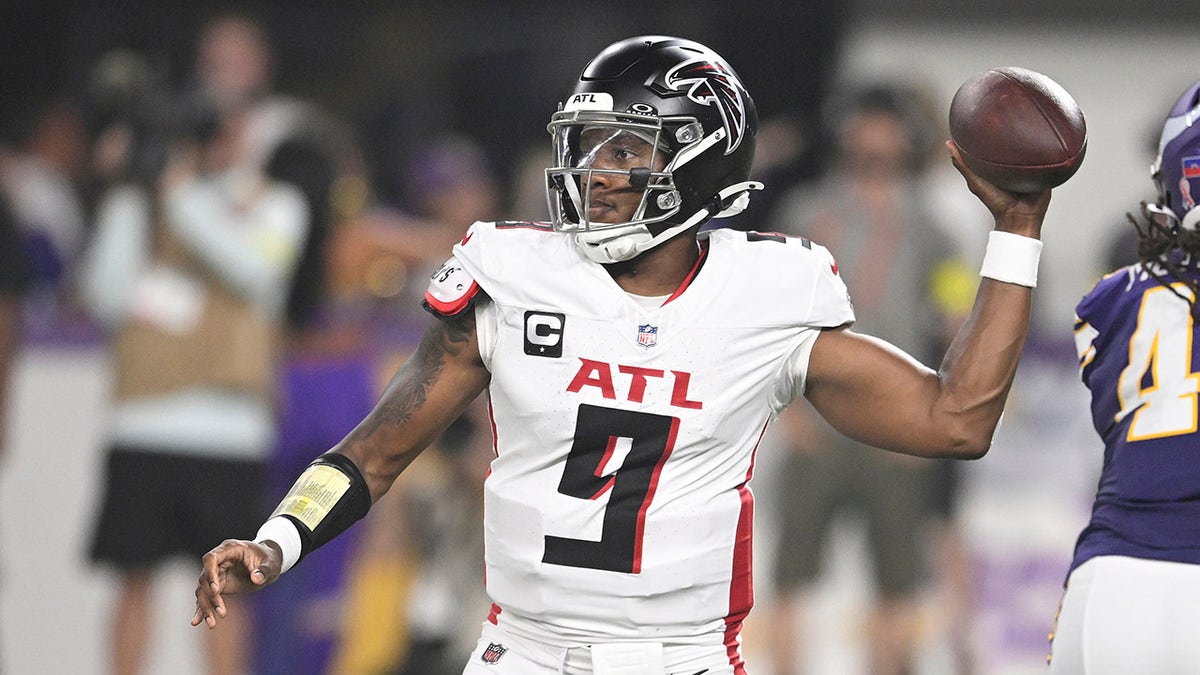 Michael Penix Jr. drops back to pass