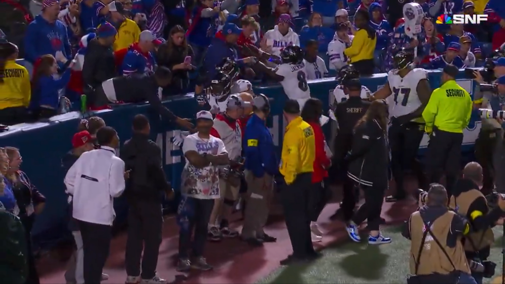 Jackson reacting after fan contacts him