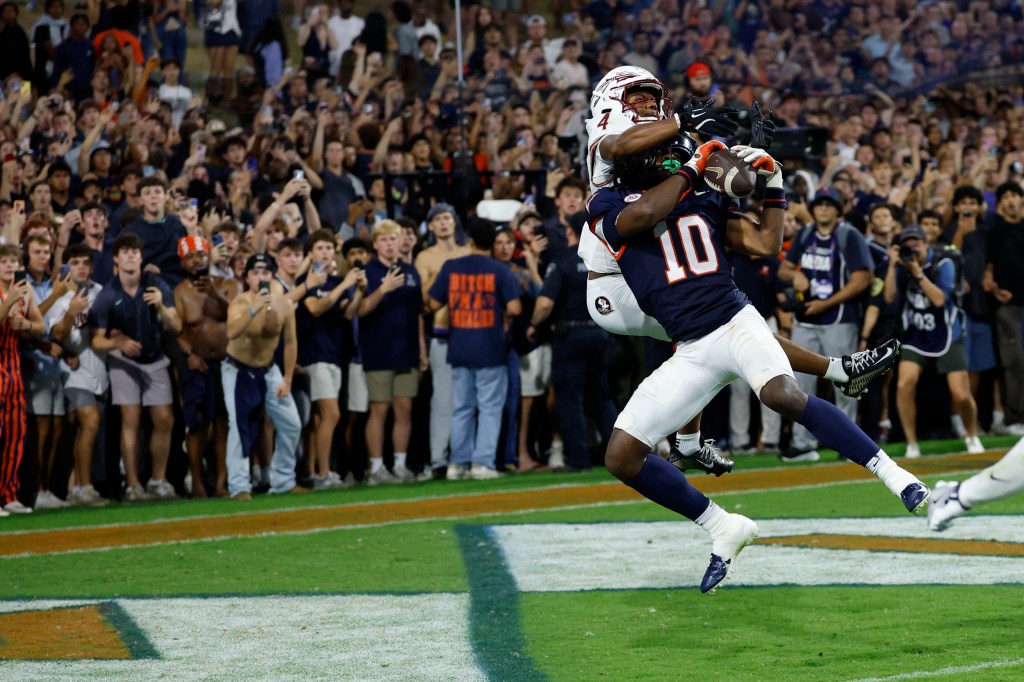 Virginia upsets No. 8 Florida State in double overtime as field storm overshadows victory