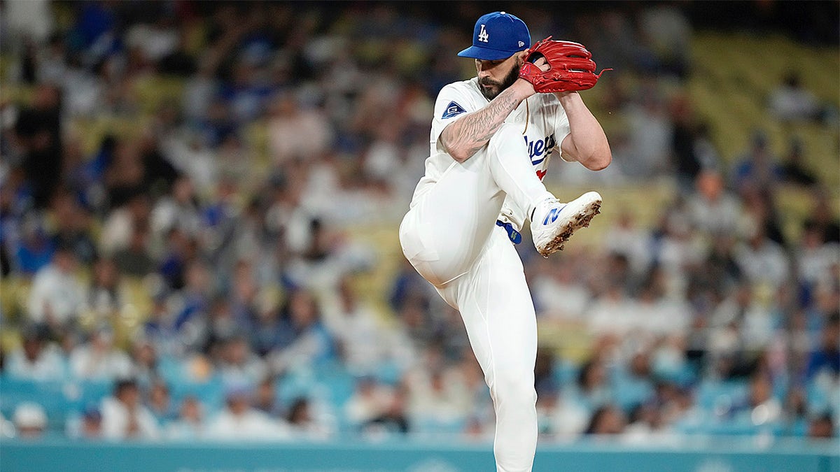 Tanner Scott delivers a pitch in the ninth inning as the Dodgers lose a combined no-hit bid