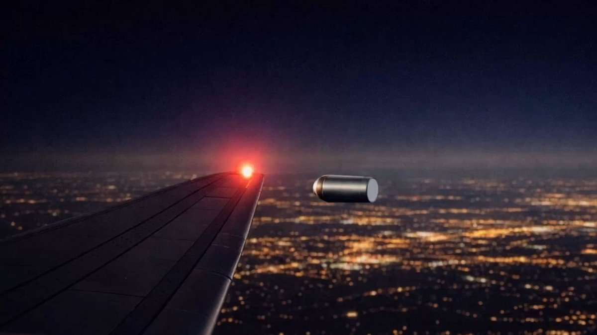 Pilot reports silver canister hovering near wing above Rhode Island during live ATC broadcast