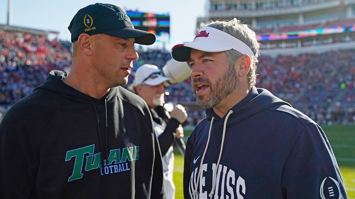 Ole Miss celebrating on the sidelines