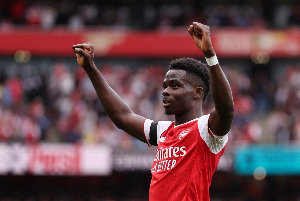 Bukayo Saka celebrates