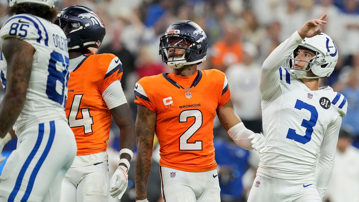 Colts players celebrate after the win