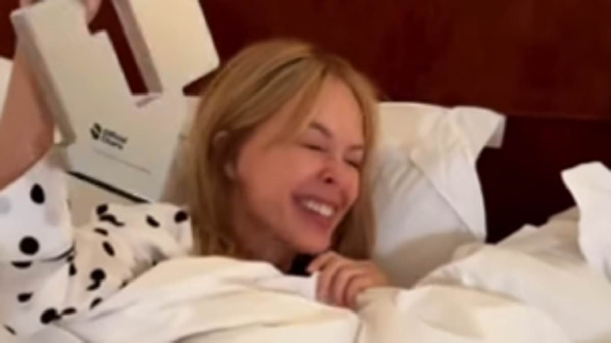 Kylie Minogue earns first UK Christmas Number 1 with XMAS