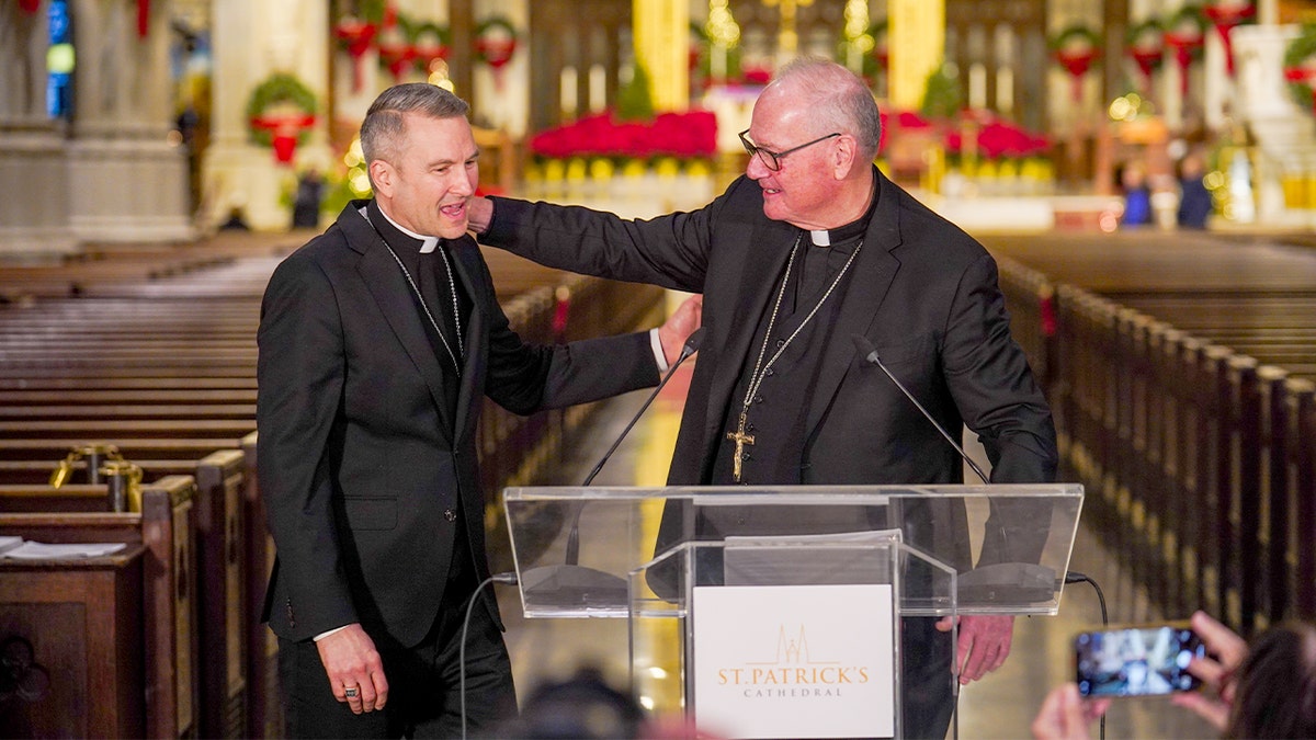 Timothy Dolan and Ronald Hicks in New York