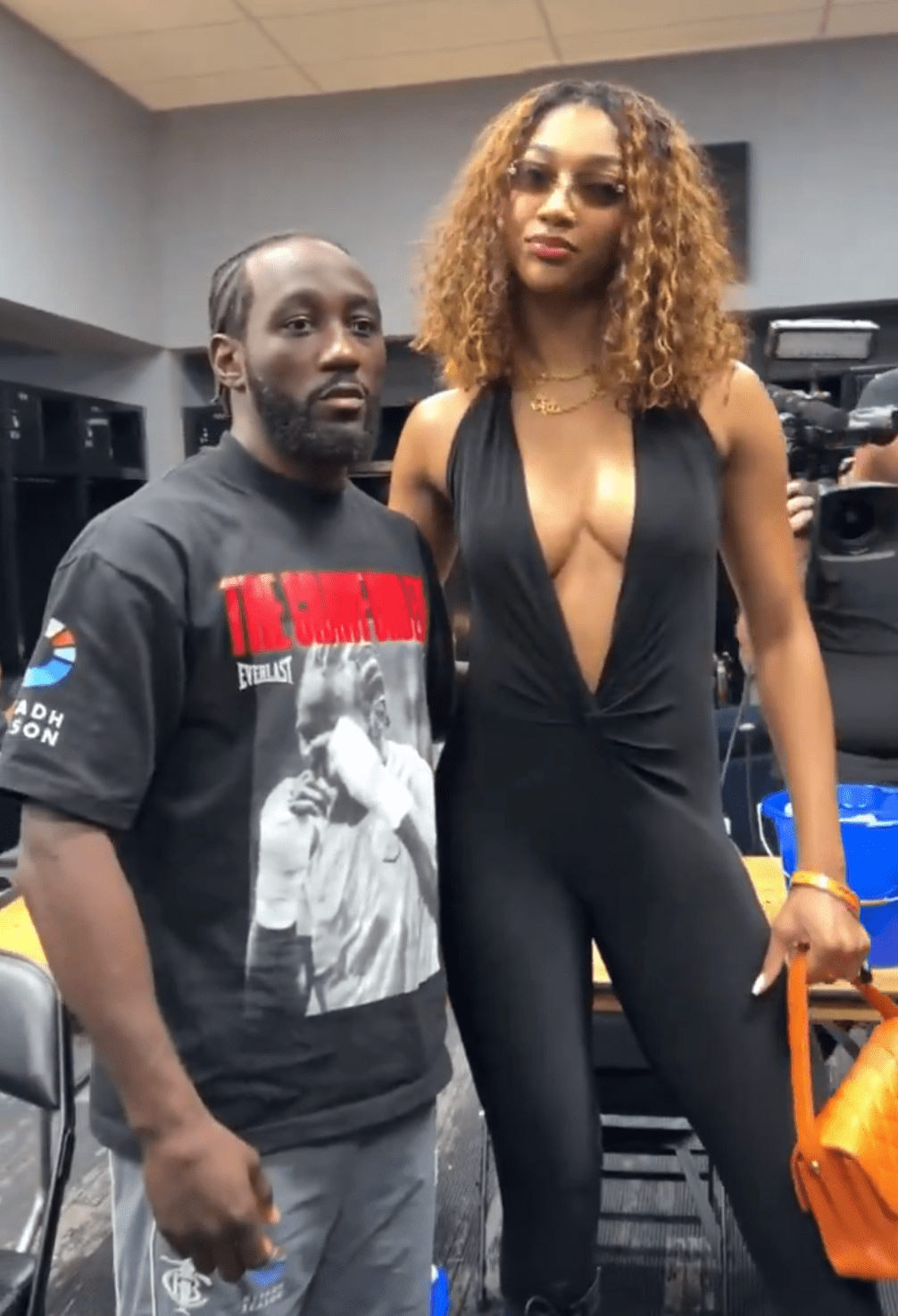 Terence Crawford and Angel Reese pose before the fight