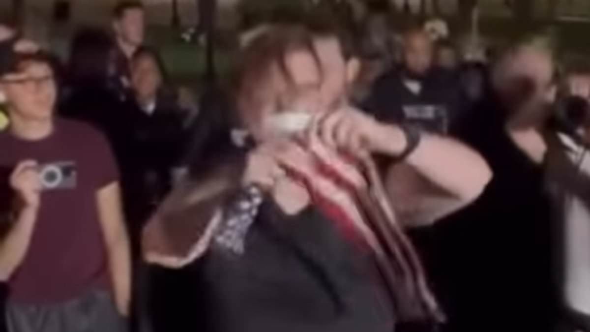 Woke protester desecrates American flag during Charlie Kirk vigil in Boston; two arrested