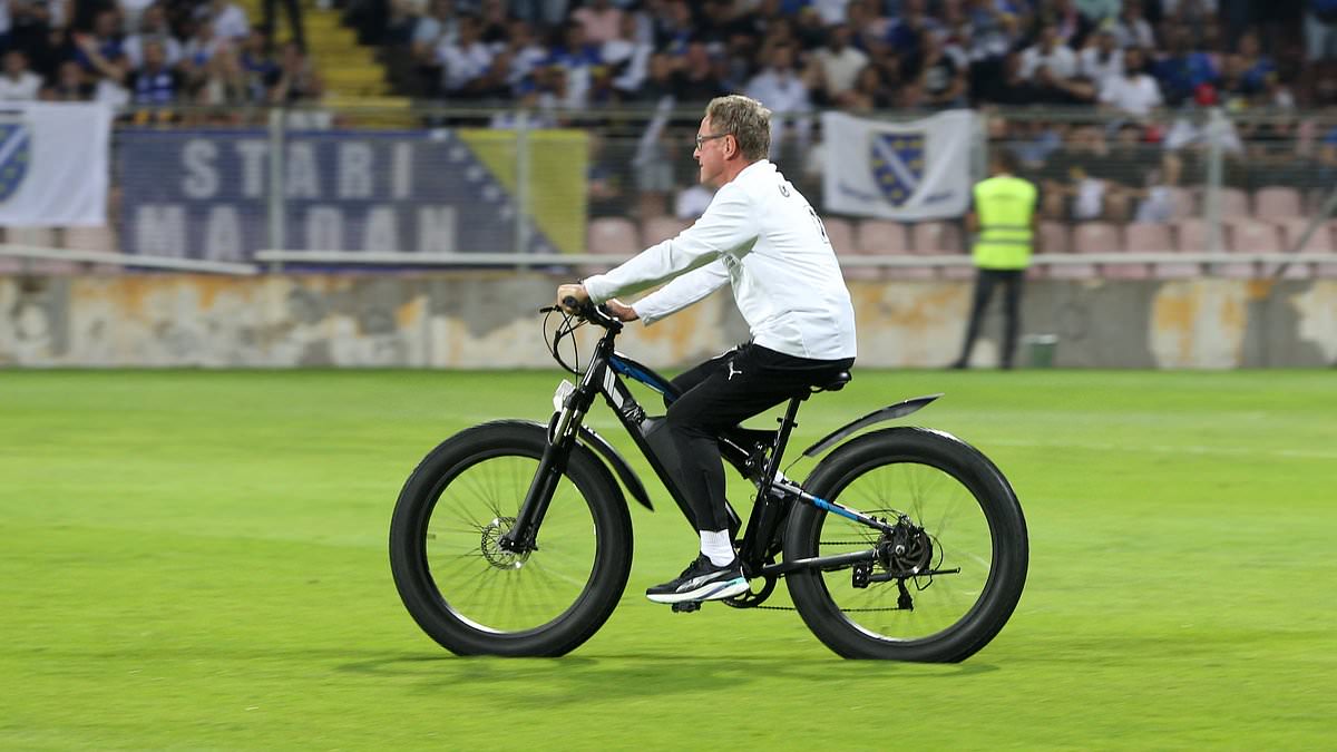 Ralf Rangnick cycles onto pitch as Austria beat Bosnia in World Cup qualifier
