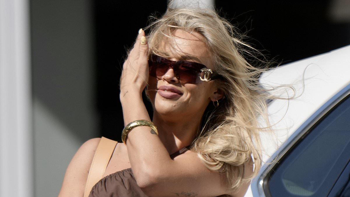 Tammy Hembrow endures wind-swept hair and romance rumors on Gold Coast eve of Bailey Smith’s grand final