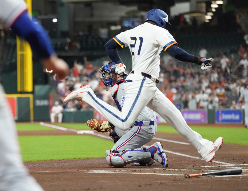 Astros’ Yordan Alvarez exits after left ankle injury stepping on home plate