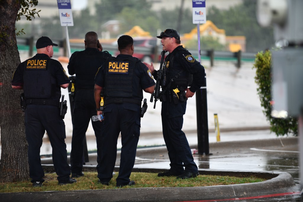 Dallas police and federal agents at scene