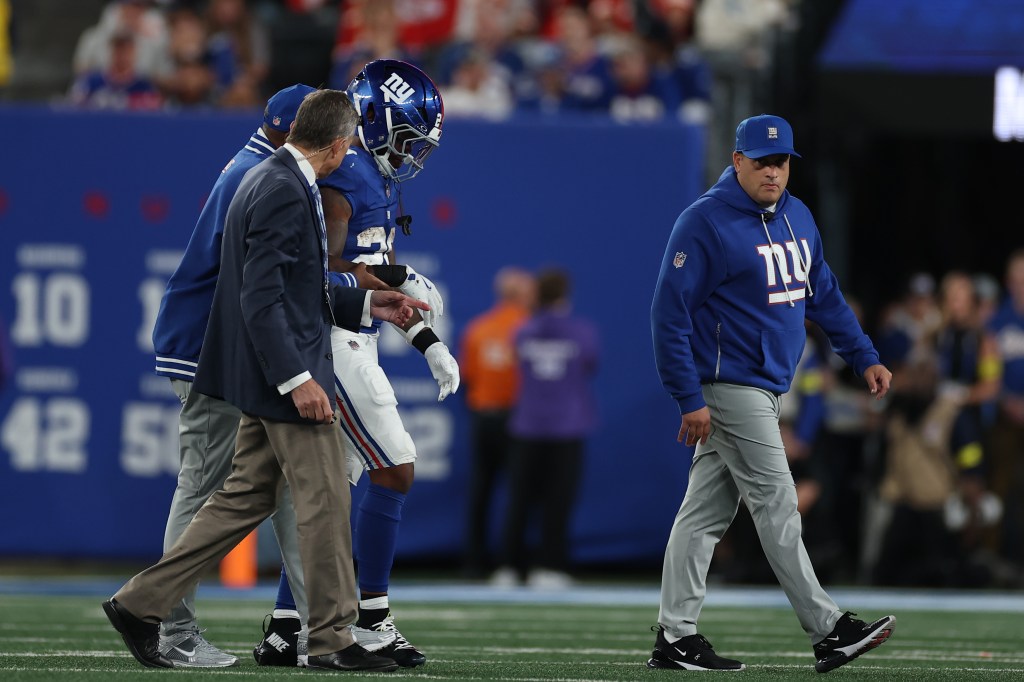 Tyrone Tracy Jr. on the sideline