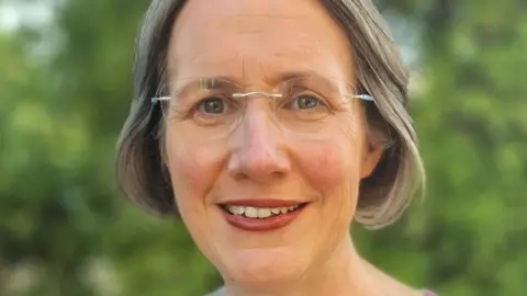 Doctors walking into practice