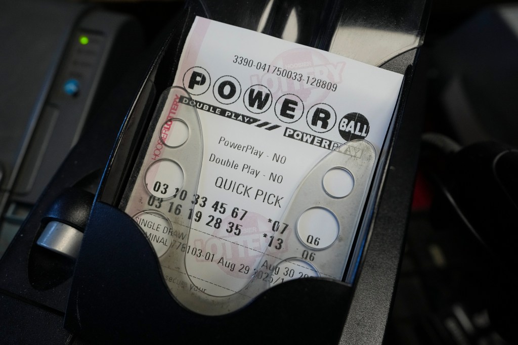 Powerball tickets come off the printer