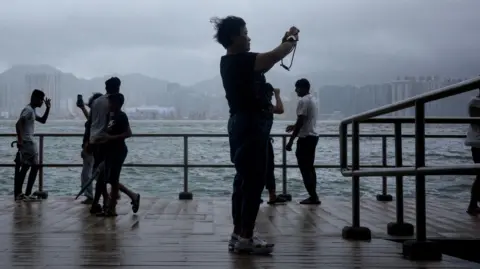 Hotel hallway with evacuated families