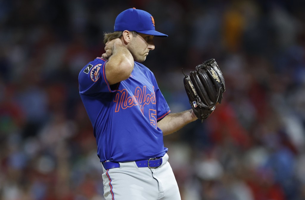 Justin Hagenman reacts after giving up a three-run homer