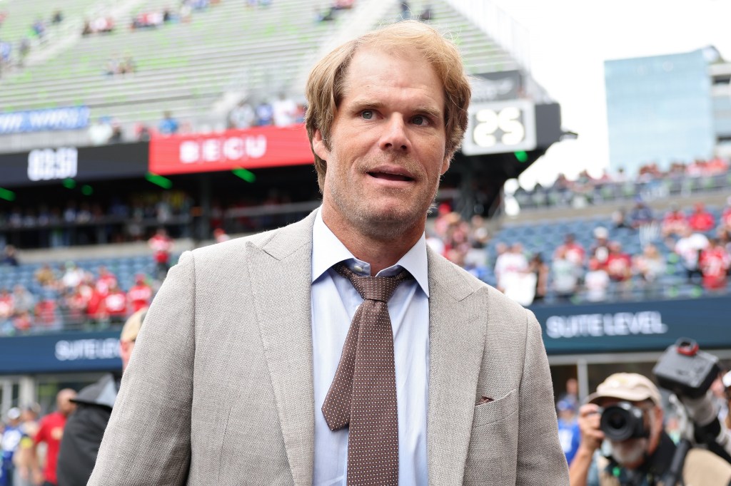 Broadcaster Greg Olsen looks on prior to an NFL game