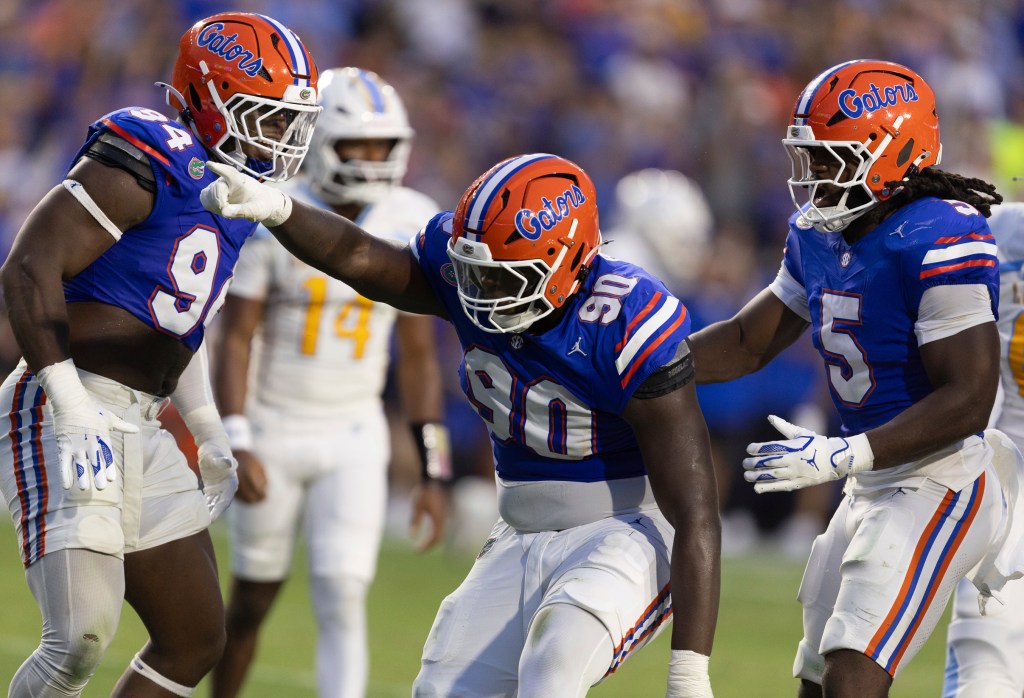 Florida defensive lineman Brendan Bett (90) celebrates a tackle earlier in the season