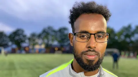 Somalia-born football coach builds life in Belfast after perilous smuggling ordeal