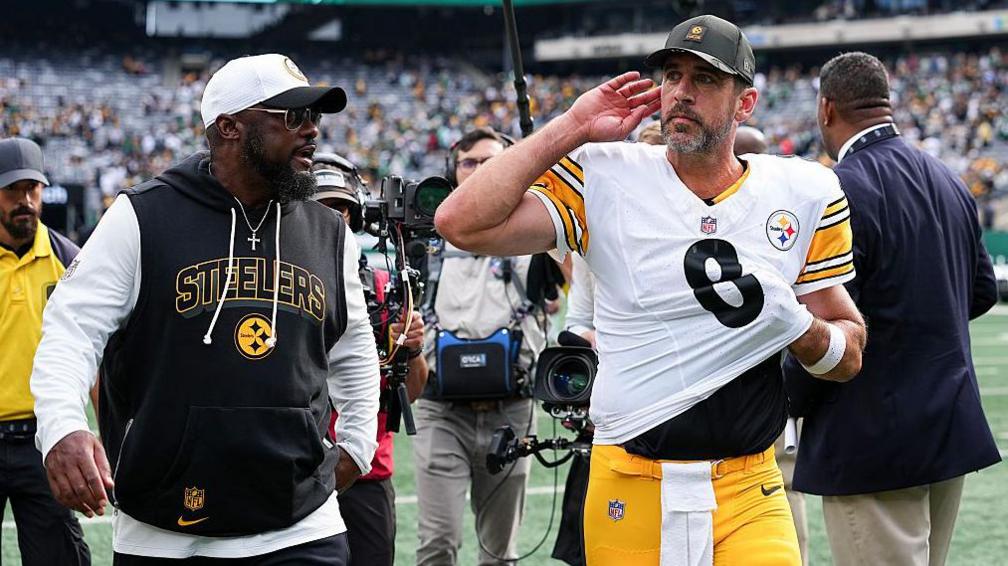 Aaron Rodgers celebrates against the Jets