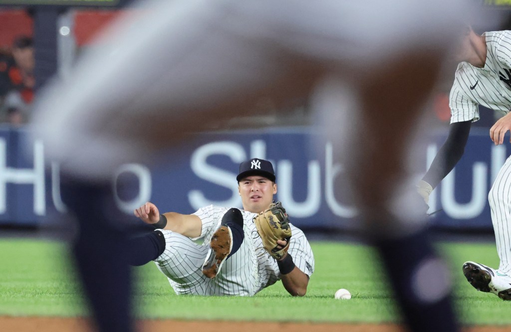 Anthony Volpe fails to catch a short pop-up in the seventh