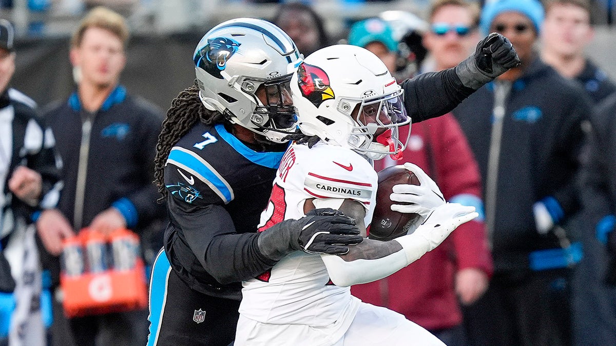 Jadeveon Clowney panthers looks on pregame